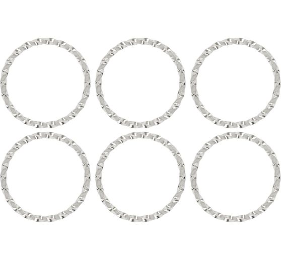 Metal ring twisted