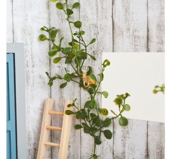 Pique de fleurs avec feuillage vert