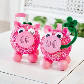 Faire des cochons porte-bonheur